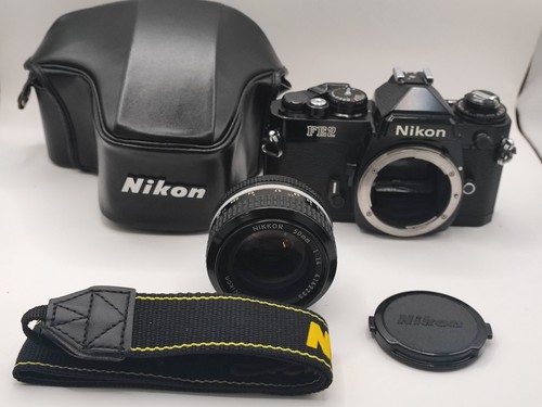Quasi perfetto nikon fe2 nero - quasi,