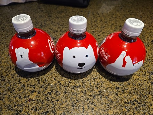 Three coca cola - 13.5, oz.