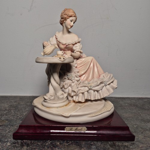 Statuina porcellana merli - b.,
