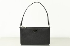 borsa a tracolla minimalista PRADA mini bag saffiano pelle logo triangolo 20 cm