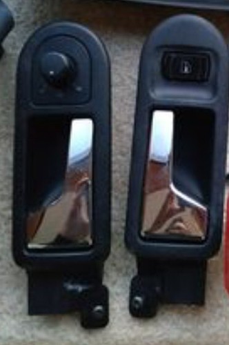 Maniglie portiere anteriori - maniglie,