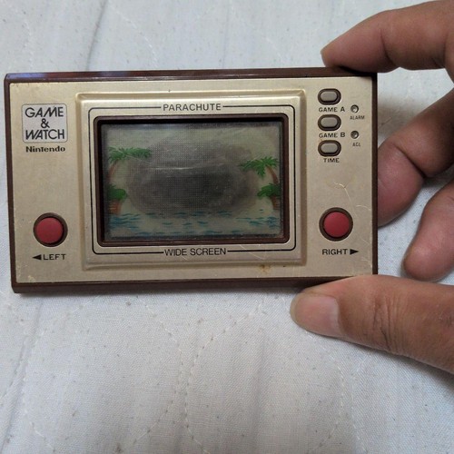 Nintendo game watch - &,