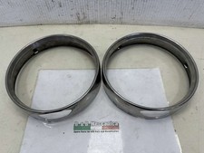 PAIR OF HEADLIGHT FRAMES FRONT