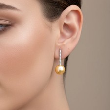 Orecchini pendenti con perla e