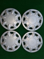 4 COPRICERCHI COPRI RUOTE PATTANE COPPA RUOTE  PLATTO UNIVERSALI PEUGEOT R13