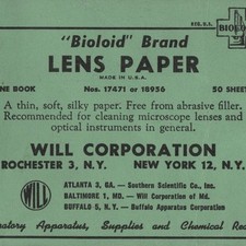 Libro di carta vintage lente