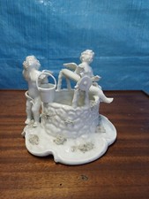 COPPIA ANGIOLETTI SUL POZZO IN