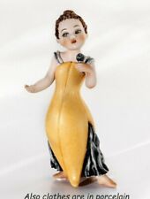Statuetta Capodimonte Statuina in porcellana di donna bambina bimba cantante  