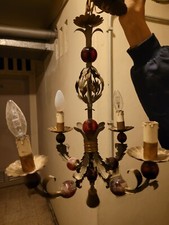 lampadario ferro battuto e vetro rosso