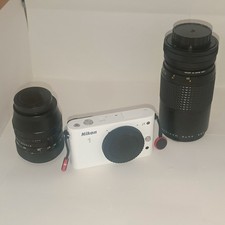 Nikon J1 con adattatore M42 + 2 obiettivi vintage (Makinon 75-150mm e Fujinon 55