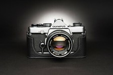 Custodia mezza fotocamera in