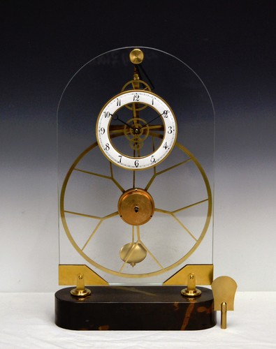 Orologio scheletro base marmo