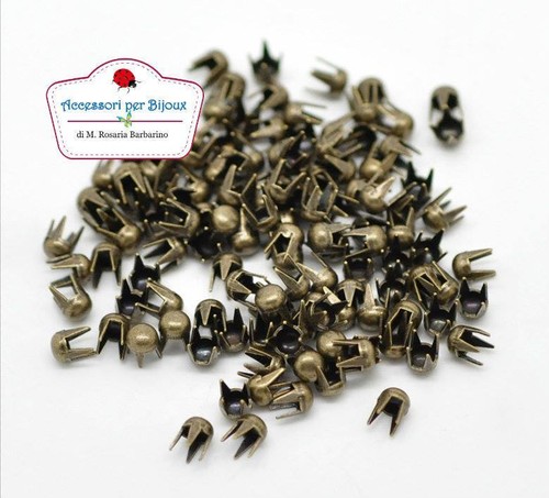 Borchie cono con rivetto tono - con,