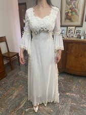 MERAVIGLIOSO ABITO DA SPOSA SARTORIALE COLOR AVORIO.