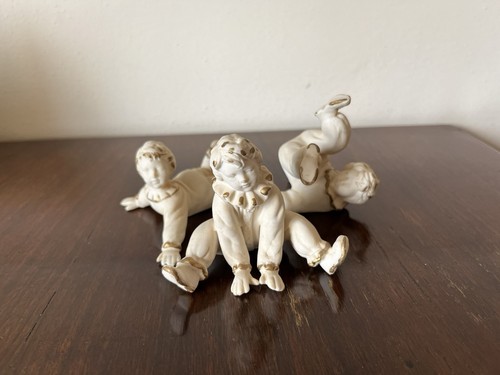 Tre putti porcellana - putti,