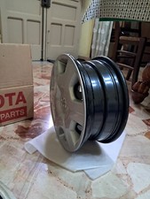 4 cerchi in ferro piu copricerchio toyota yaris anno 2004