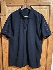 Roberto Cavalli "Just Cavalli" polo nera con borchie e bottoni nero lucido tagli