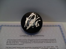 Elvis Merzlikins autografo