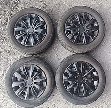 CERCHI in ferro da 15" e GOMME 4 stagioni 195/60R15 4x108 *solo borchie Argento*