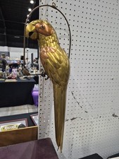 Scultura altalena pappagallo