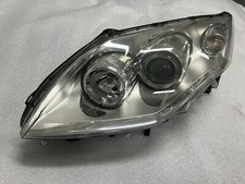 PROIETTORE-FARO SX.        260600038R RENAULT LAGUNA 3a Serie ORIGINALE.