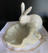 Statuina porcellana posacenere