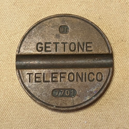 Gettone telefonico 7701 - gettone,