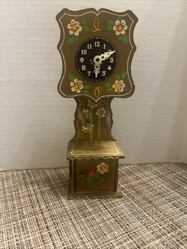 Orologio vintage miniatura - in,