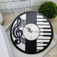 Orologio in legno da parete