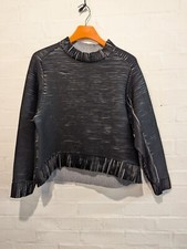5 anteprime maglione nero top