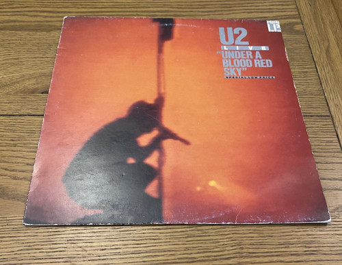 Live under a blood red - -,