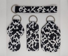 Set 4 Portachiavi, Dalmata, Leopardato, Portarossetto, Gel Pinzette, Burro Cacao
