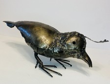 Grande scultura uccellino