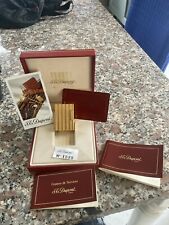 accendino S.T. DUPONT linee verticali laminato oro