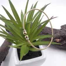 Bracciale rigido schiava a cerchio da donna in argento dorato con zirconi