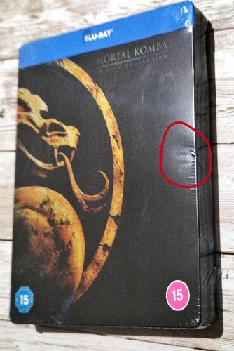 Badly dented mortal kombat - dented,