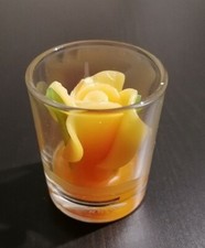 Stock candele rosa arancione profumate in vetro aroma Arancio