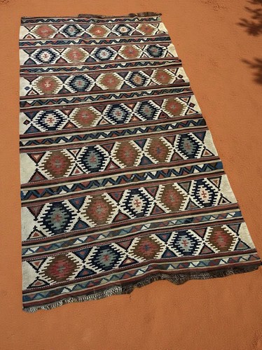 Handwoven wool kilim rug with
