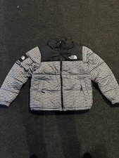 Giacca Nuptse Supreme x The North Face con borchie taglia S