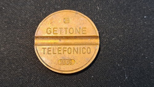Gettone telefonico 7605 ipm - telefonico,