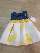 Abito neonata smanicato giallo