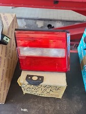 FANALE POSTERIORE INTERNO SINISTRO ORIGINALE LANCIA KAPPA 7780141 NUOVO