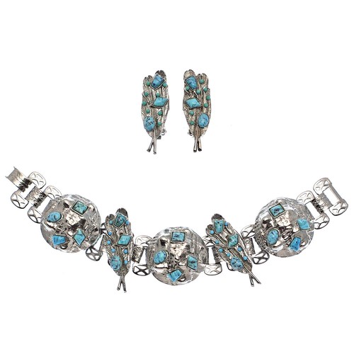Set bracciale orecchini piuma