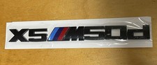 BMW X5 M50d DISTINTIVO IN nero