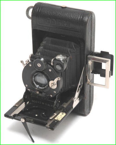 Macchina fotografica - @,