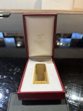 accendino cartier oro