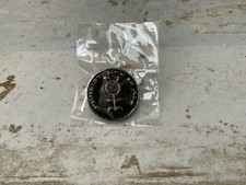 Coil badge pin Throbbing