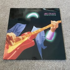 Dire Straits – Money For
