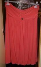 vestiti Due uno corallo e uno nero con tuta intera