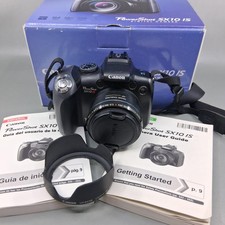 Canon PowerShot SX10 IS 10MP fotocamera digitale 20x zoom obiettivo cappuccio scatola testata funziona